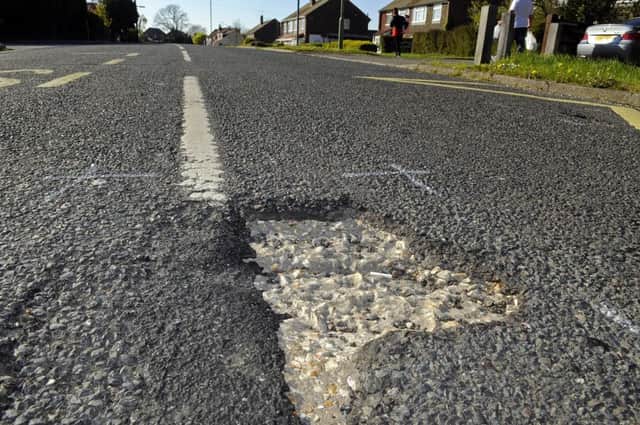 POTHOLES     (NEWS)   MRW    16/4/2014  

Potholes ! 

Mill Road in Waterlooville - very dangerous potholes litter the length of the road 

Picture: Malcolm Wells (141158-8927) PPP-140416-192808003